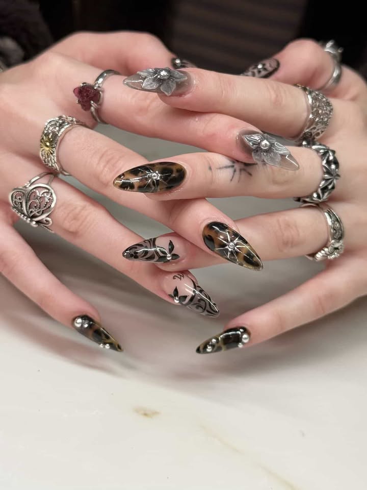 Tortoise shell nails with silver butterfly 3D charms and fine line art