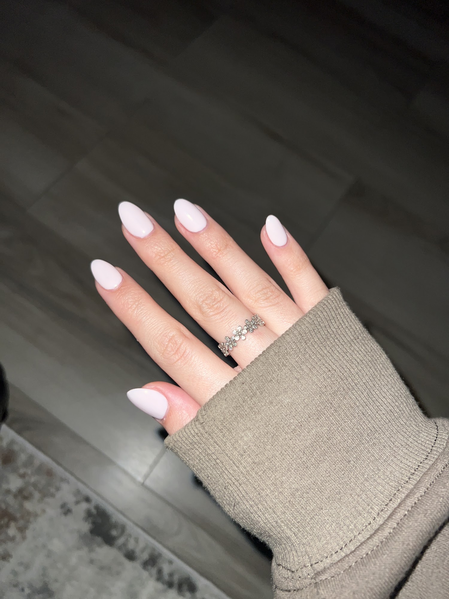 Soft white almond-shaped nails